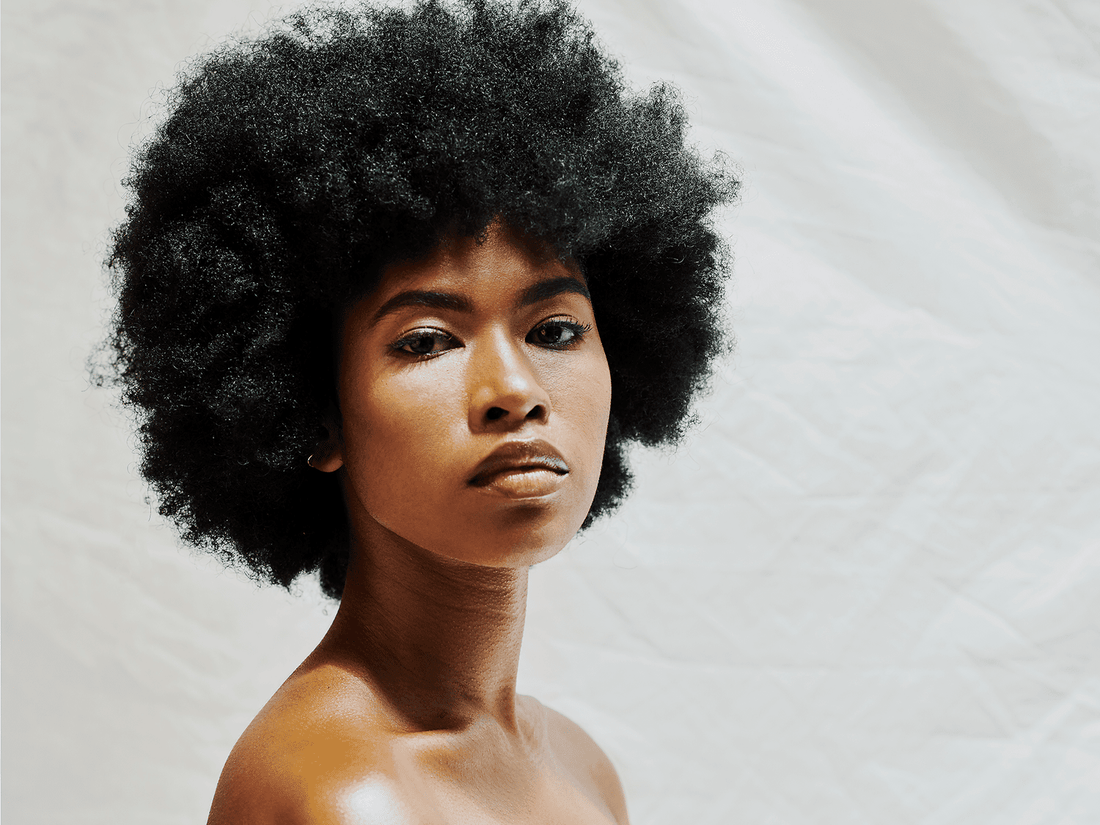 Moisture is the Secret: Why Your Hair Needs Hydration and How We Deliver It at Hello Texture Salon in Lagos